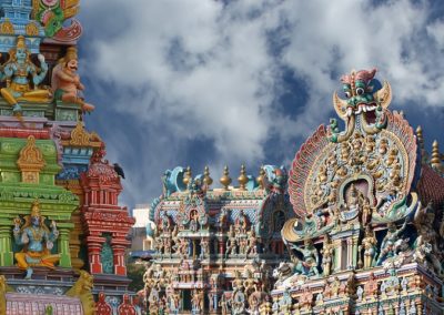 Meenakshi hindu temple in Madurai, Tamil Nadu, South India. Sculptures on Hindu temple gopura (tower). It is a twin temple, one of which is dedicated to Meenakshi, and the other to Lord Sundareswarar